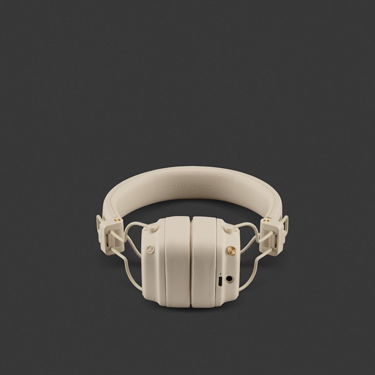 A pair of Marshall Major V Cream over-ear headphones with cushioned ear pads and adjustable headband, shown on a dark background.