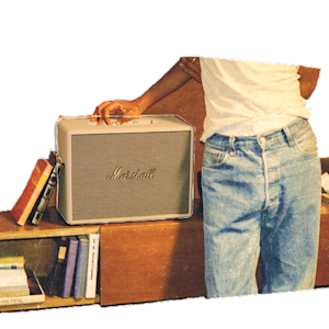 A person adjusting the settings on the top panel of the Woburn III