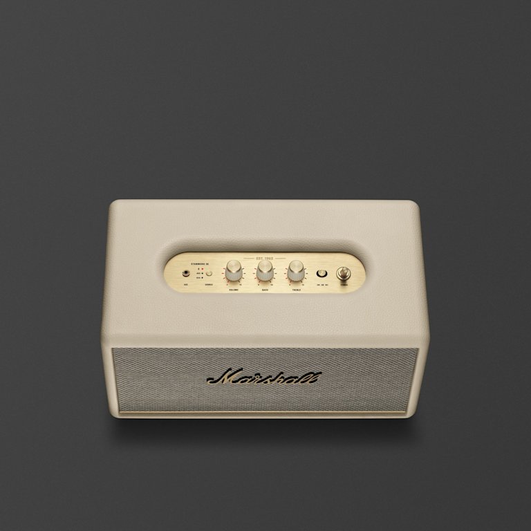 Marshall STANMORE III Cream bluetooth speaker in beige and gold.