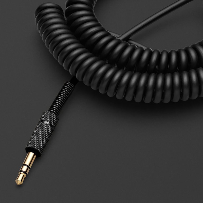 A Marshall Speaker Audio Cable Pitch Black on a black surface.