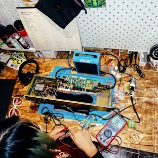 Gliico working on technical equipment