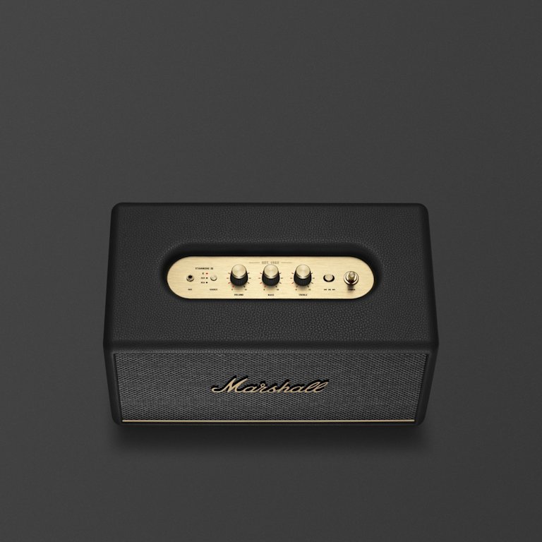 The Marshall Stanmore III Black speaker in gold is a stylish home speaker equipped with Bluetooth technology.