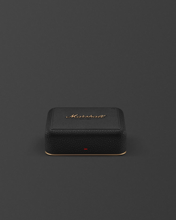 Heddon with a textured surface and a gold logo, placed on a plain dark background.