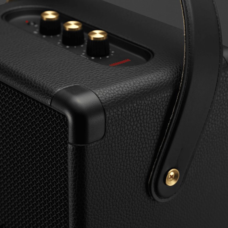 Focused image on the golden details of Marshall Tufton Black and Brass speaker.