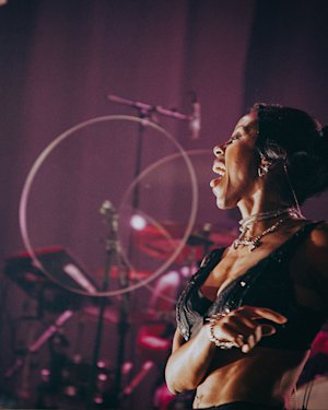 Nova Twins singing on stage