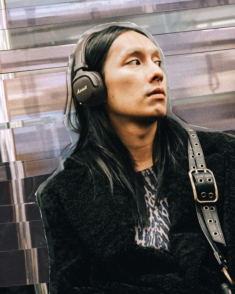A person wearing the Milton A.N.C. in Brown while riding the subway
