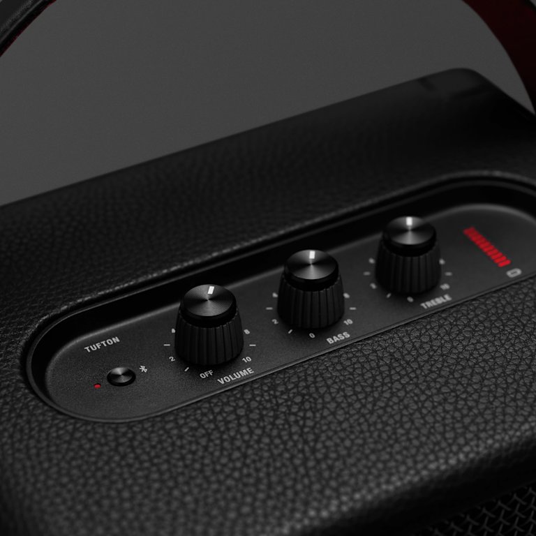 A close up of the control buttons on a black Marshall Tufton Black speaker
