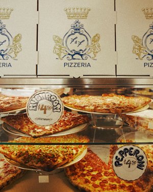 Pizzas on display in a restaurant