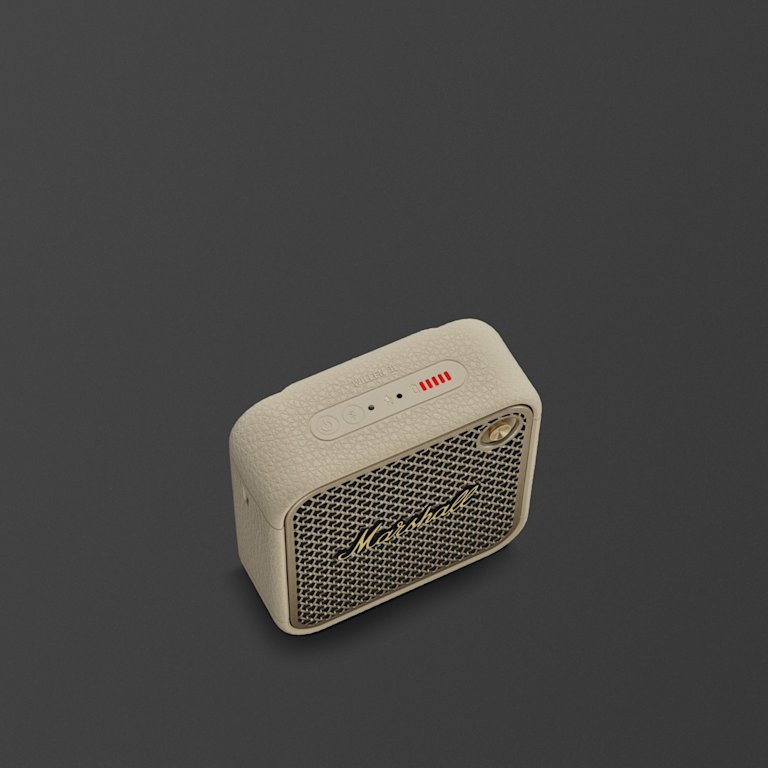 Marshall Willen II Cream bluetooth speaker with a control buttons on top, and a gold volume knob against a dark background.