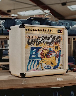 Side view of Studio 900 Combo Lunar New Year Edition 2026 on a workbench in a factory setting.