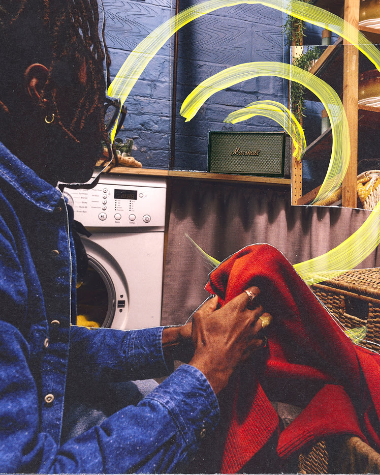 A person sits in front of a washing machine, folding a red garment. Marshall Acton IV Black speaker and shelves are in the background.