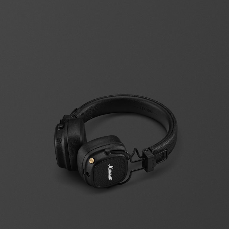 Marshall Major V Black on-ear headphones against a dark background.