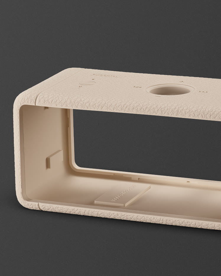 Close up of a Emberton II Cream Sleeve set against a plain dark background.