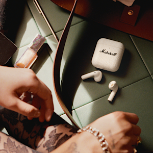 The Marshall Minor IV Cream placed on top of green tiles