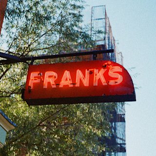 A LED Frank's sign in front of the Frank's restaurant