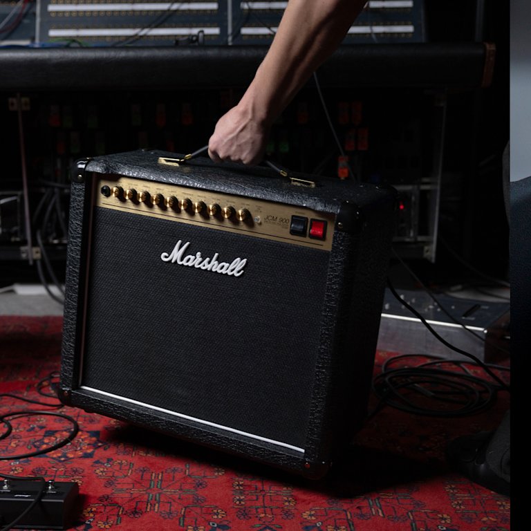 A person holding the Studio 900 Combo by the handle
