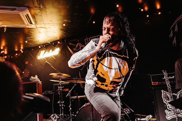 An artist performing live on stage