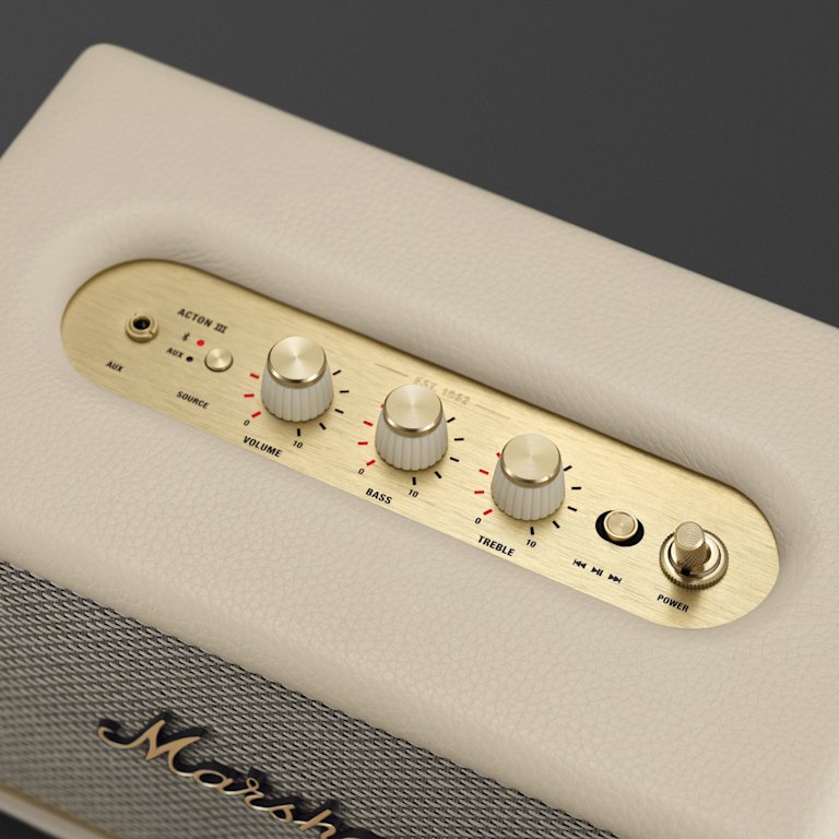A white Marshall ACTON III CREAM speaker with buttons on it.
