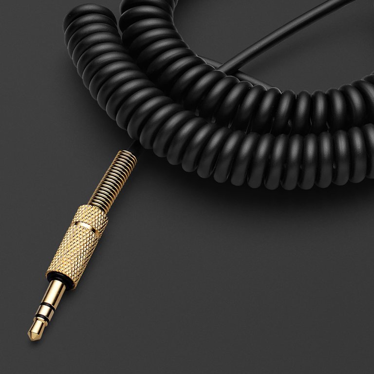 A Marshall SPEAKER AUDIO CABLE on a black surface.