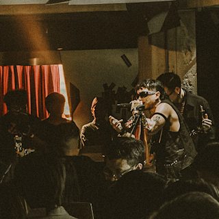The Molotovs performing on stage
