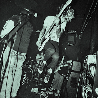 Knives playing live on stage