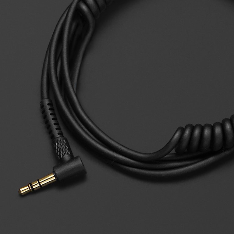 A Marshall headphone audio cable black with a gold connector on it.
