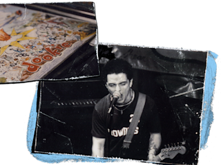 Bille Joe Armstrong performing in an orange stage