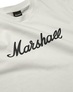 A zoomed image on the white Marshall script t-shirt