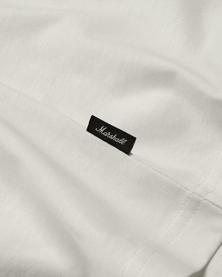 Close-up of a Mouth Reissue T-shirt White with a small black label that reads "Marshall" in script font.