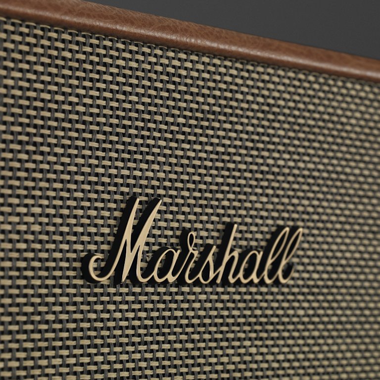 A close up of the ACTON III BROWN speaker with the word Marshall on it.
