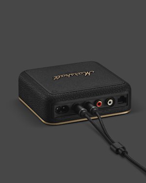 A lead cable connected to the LINE IN on the back of a Marshall Heddon streaming hub.