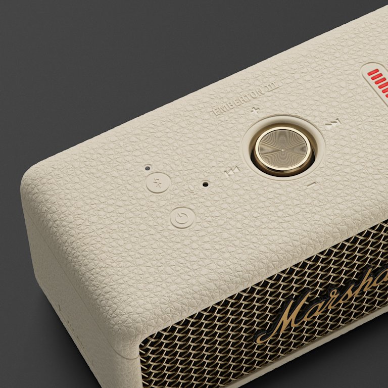 A close-up of Marshall Emberton III Cream speaker.