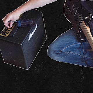A beginner player connected to a Marshall MG amplifier