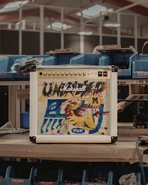 Studio 900 Combo Lunar New Year Edition 2026 sits on a workbench in a factory setting.