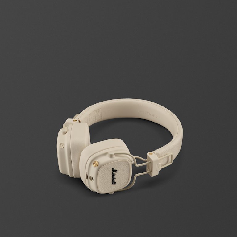 A white pair of Marshall Major V Cream on-ear headphones displayed on a dark background.