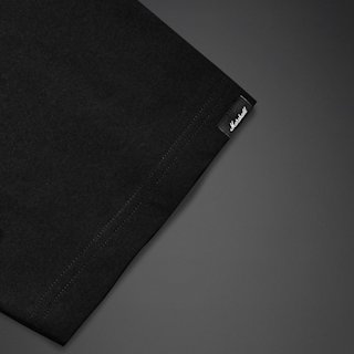 Close-up of a Stax Reissue T-shirt sleeve with visible stitching along the edge and a small “Marshall” brand tag attached.