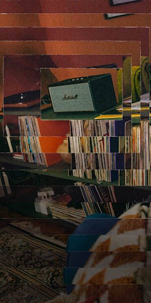 Seye looking at vinyl records whilst listening to music on his Marshall Stanmore IV