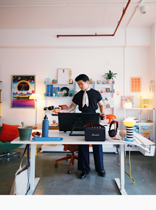 Michael Lim doing coffee while working