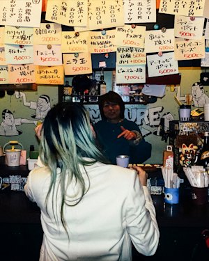 Gliiico at a restaurant in Tokyo
