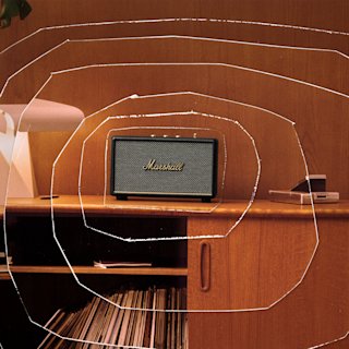 Marshall Acton III home speaker on top of a tv rack