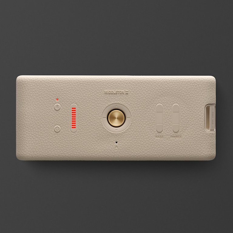 Marshall Middleton II Cream portable Bluetooth speaker featuring a central round button, red indicator, two switches, and a slider.