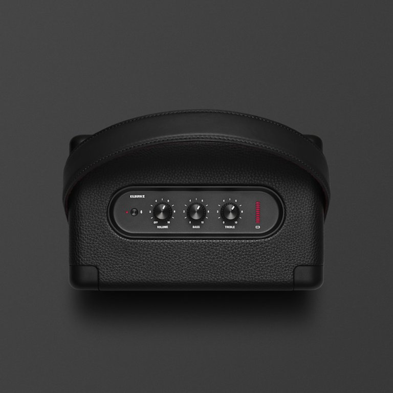 A black Marshall KILBURN II BLACK speaker on a black surface.