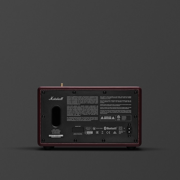 Rear view of a Marshall Acton III Burgundy speaker showing input ports, power switch and labels.
