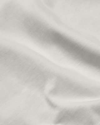 Close-up of the white organic cotton fabric.