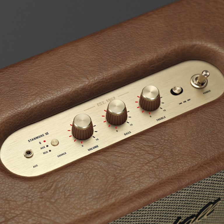 A close up of a brown leather Marshall STANMORE III BROWN home speaker.