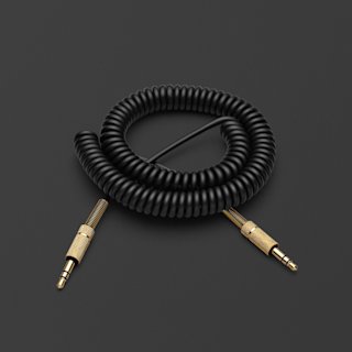 Black Marshall speaker audio cable on a black surface.