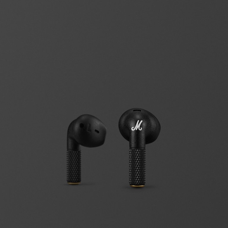 A pair of black Marshall Minor IV Black earbuds against a dark background.