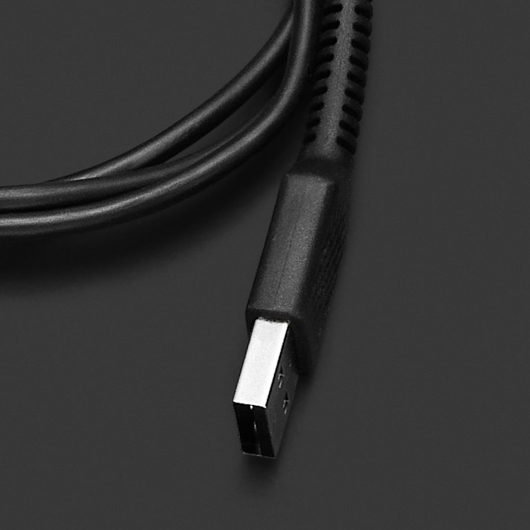 A Marshall USB-C LONG CHARGING CABLE on a black surface.