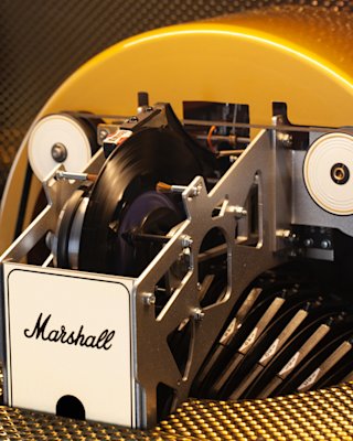 Detalles en color crema y dorado de la máquina de discos Marshall