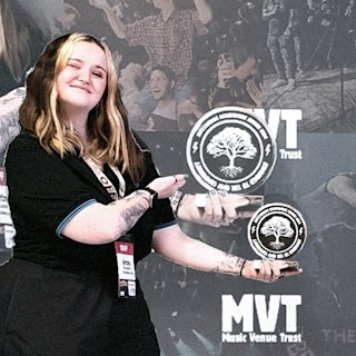 A person pointing at a logotype